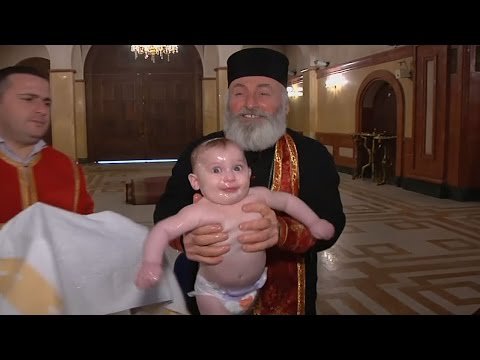 This baptism in Georgia is enough to make your head spin